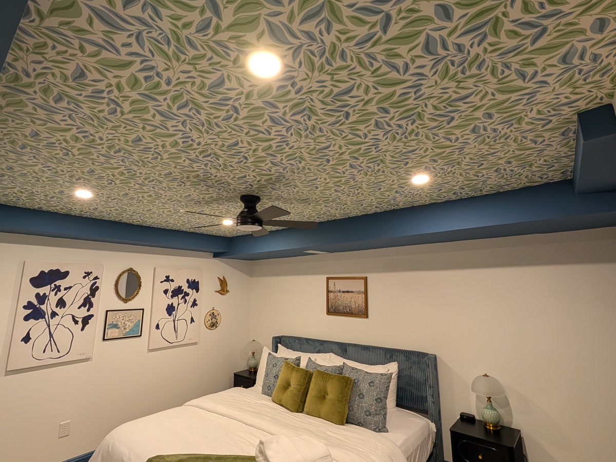 Bedroom — patterned paper taken across the ceiling