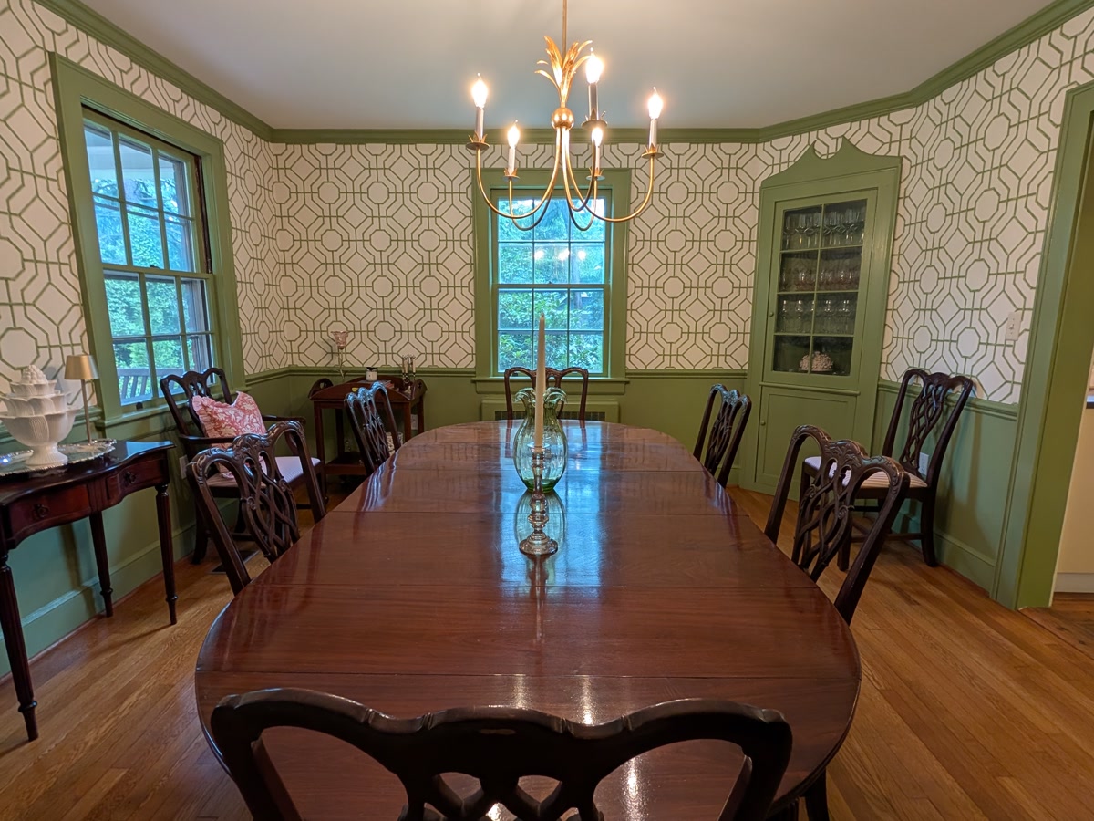 Dining room — trellis paper above existing green wainscot