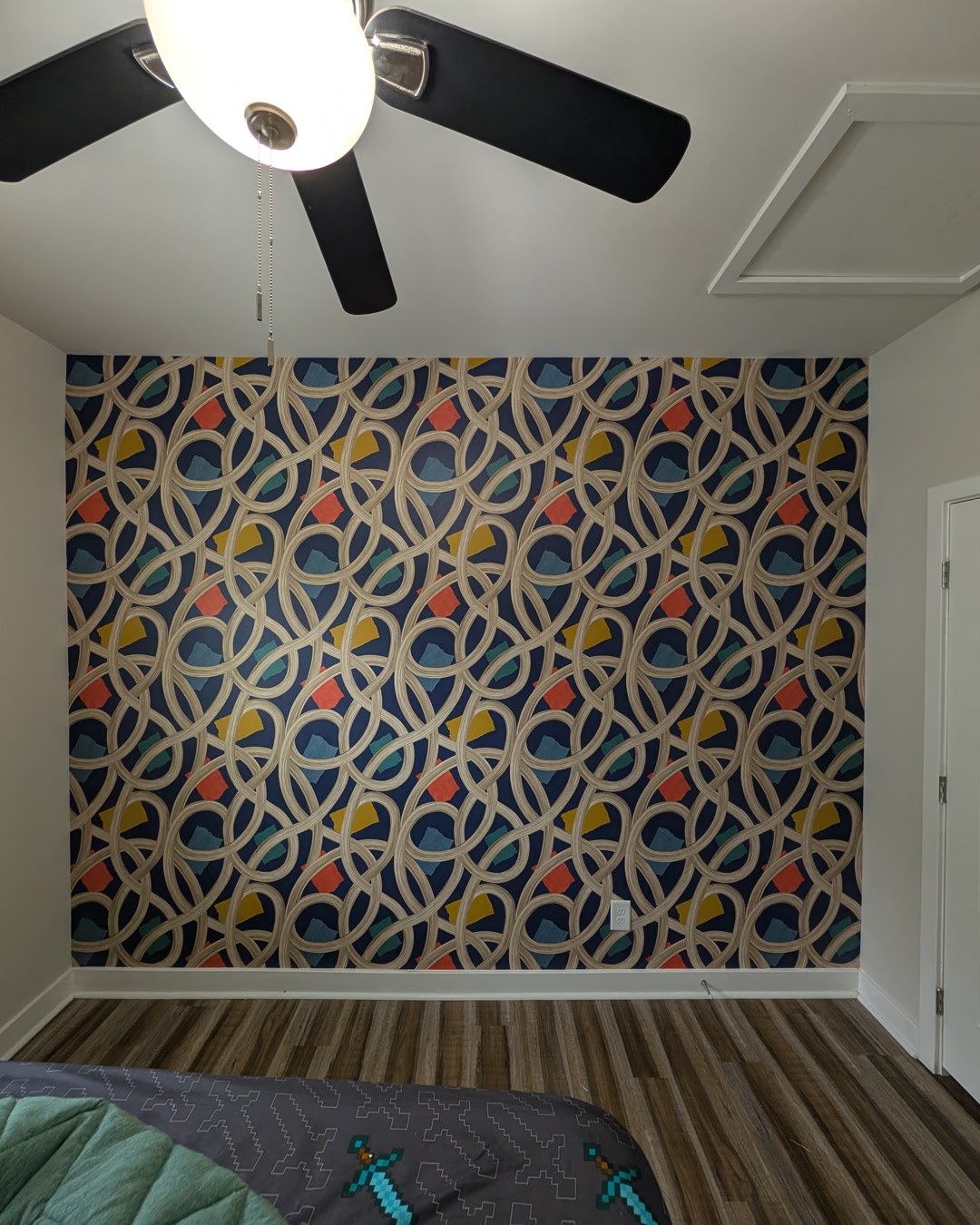 Kids' room — bold retro geometric feature wall